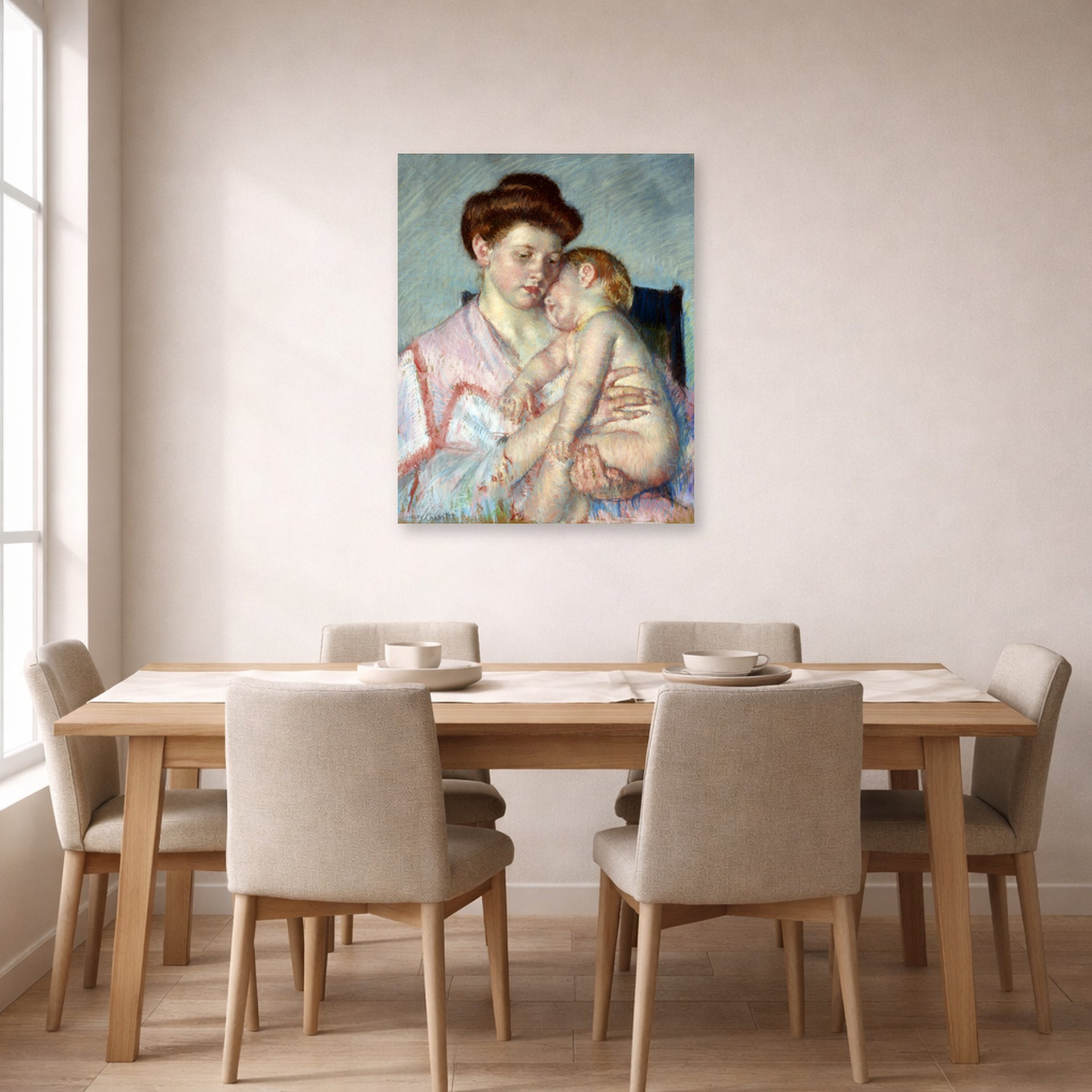 Unframed poster print of Mary Cassatt's Sleepy Baby displayed on a wall in a dining room