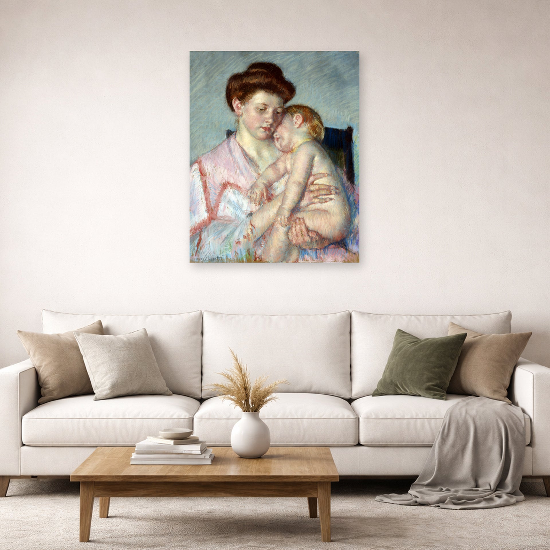 Unframed poster print of Mary Cassatt's Sleepy Baby displayed on a wall in a living room