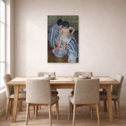 Unframed poster print of Mary Cassatt's The Childs Bath displayed on a wall in a dining room