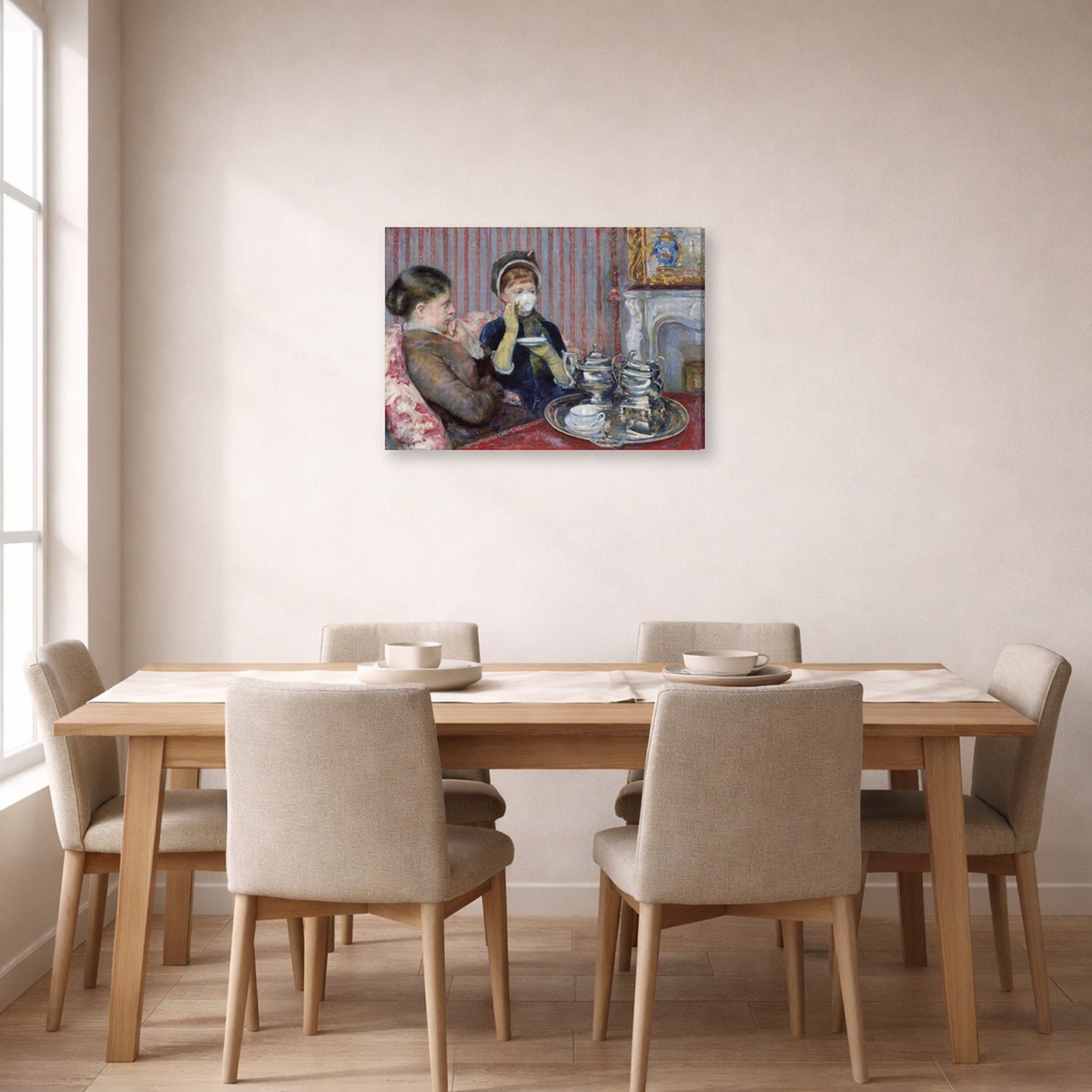 Gallery-wrapped canvas print of Mary Cassatt's The Tea displayed on a wall in a dining room