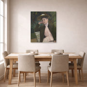 Gallery-wrapped canvas print of Mary Cassatt's Young Girl with a Brown Hat displayed on a wall in a dining room