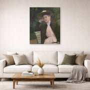 Gallery-wrapped canvas print of Mary Cassatt's Young Girl with a Brown Hat displayed on a wall in a living room