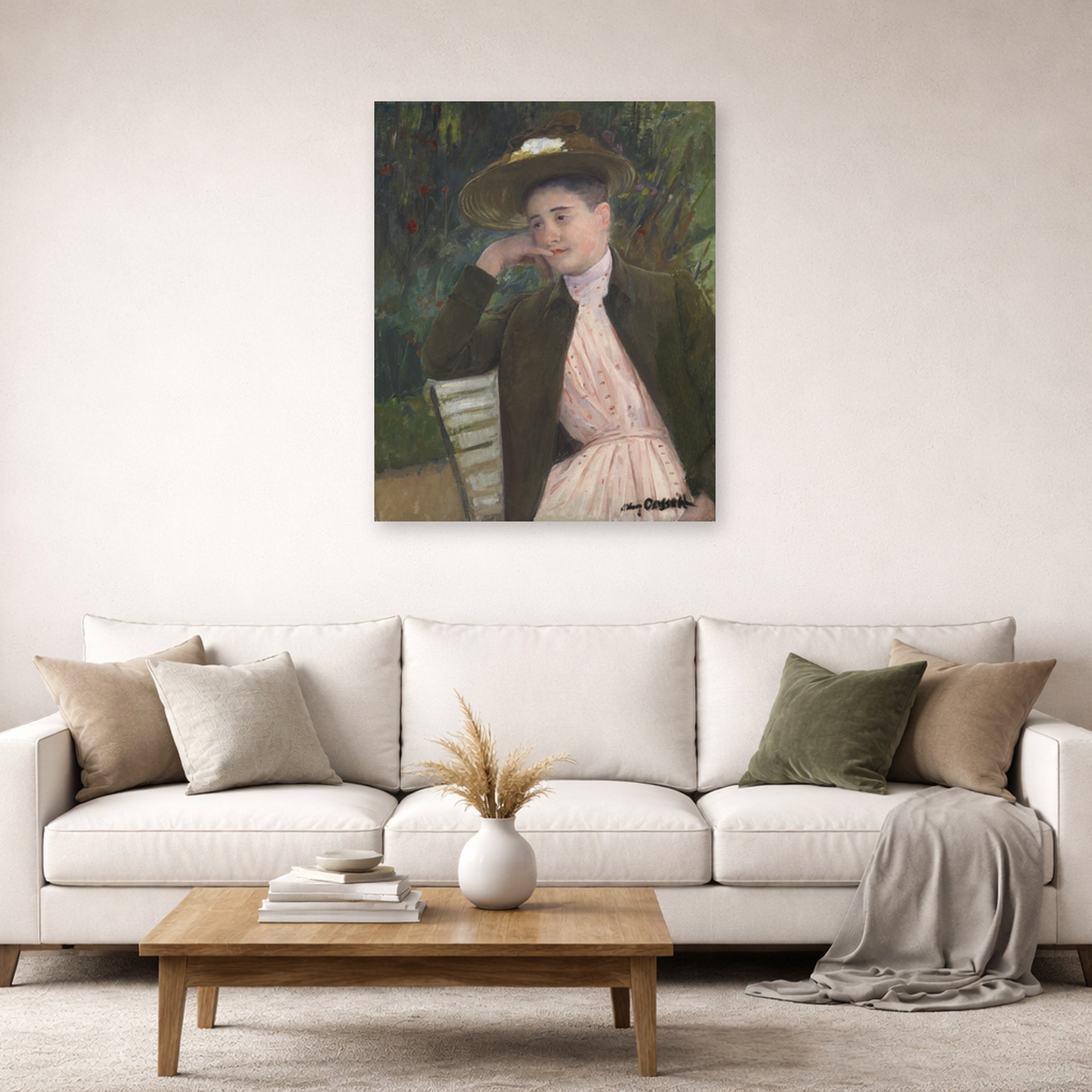 Unframed poster print of Mary Cassatt's Young Girl with a Brown Hat displayed on a wall in a living room