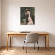 Unframed poster print of Mary Cassatt's Young Girl with a Brown Hat displayed on a wall in a office