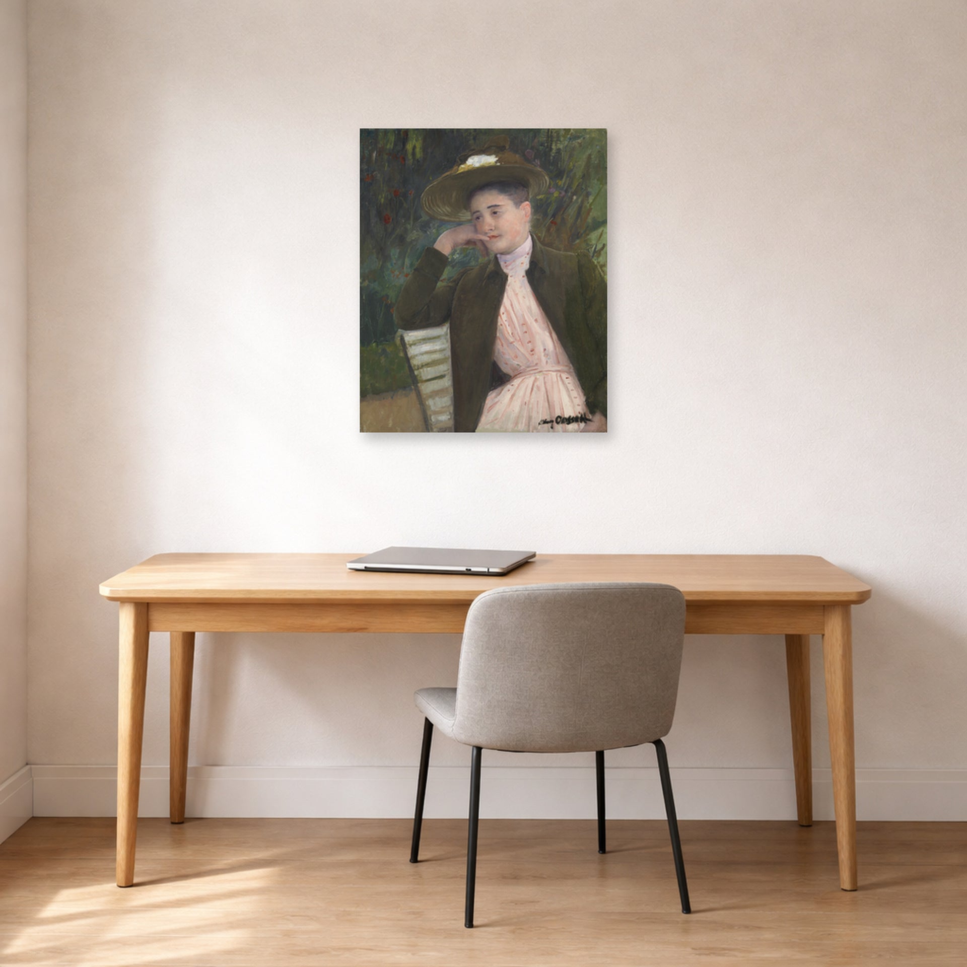 Unframed poster print of Mary Cassatt's Young Girl with a Brown Hat displayed on a wall in a office