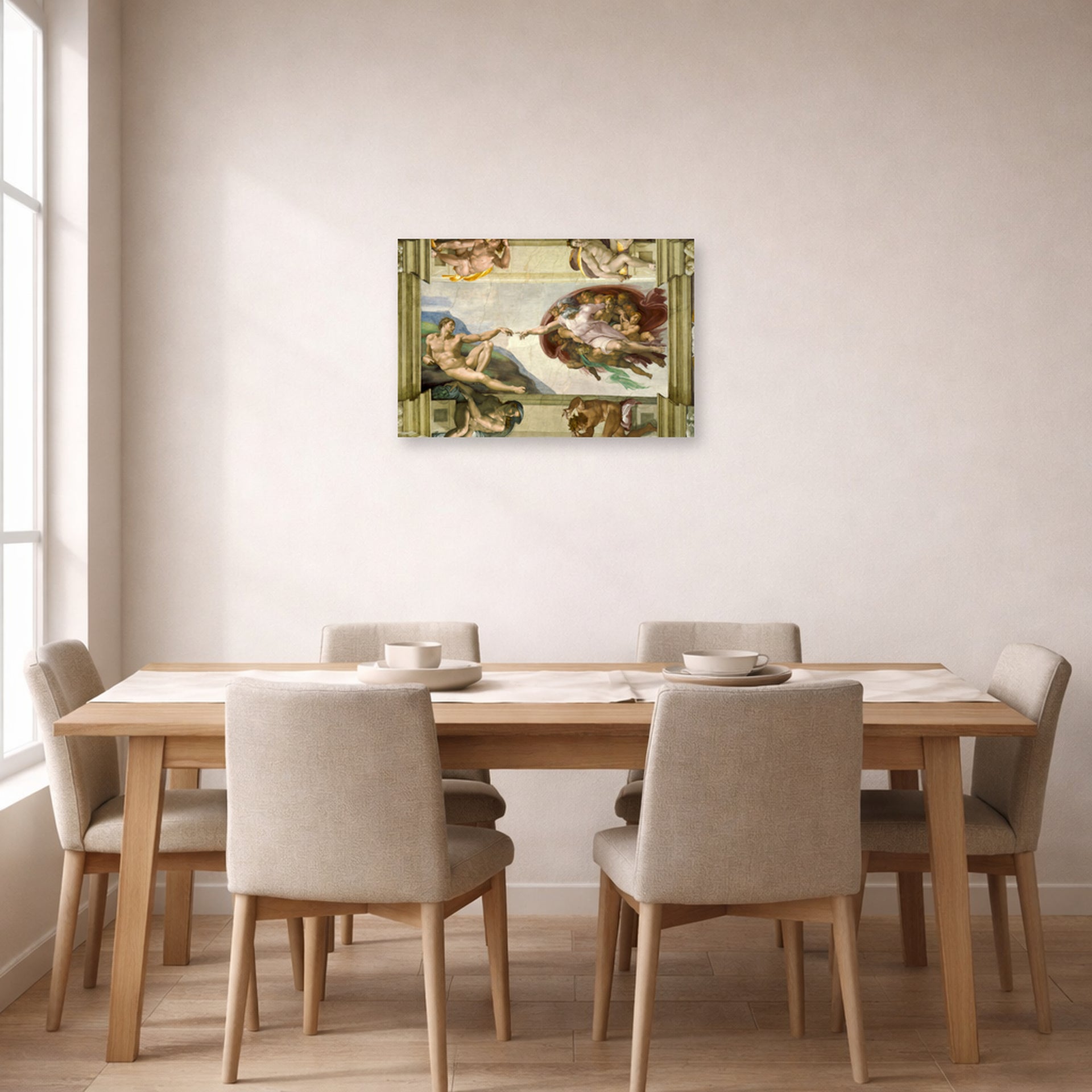 Unframed poster print of Michelangelo's Creation of Adam displayed on a wall in a dining room