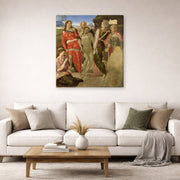 Gallery-wrapped canvas print of Michelangelo's Entombment displayed on a wall in a living room