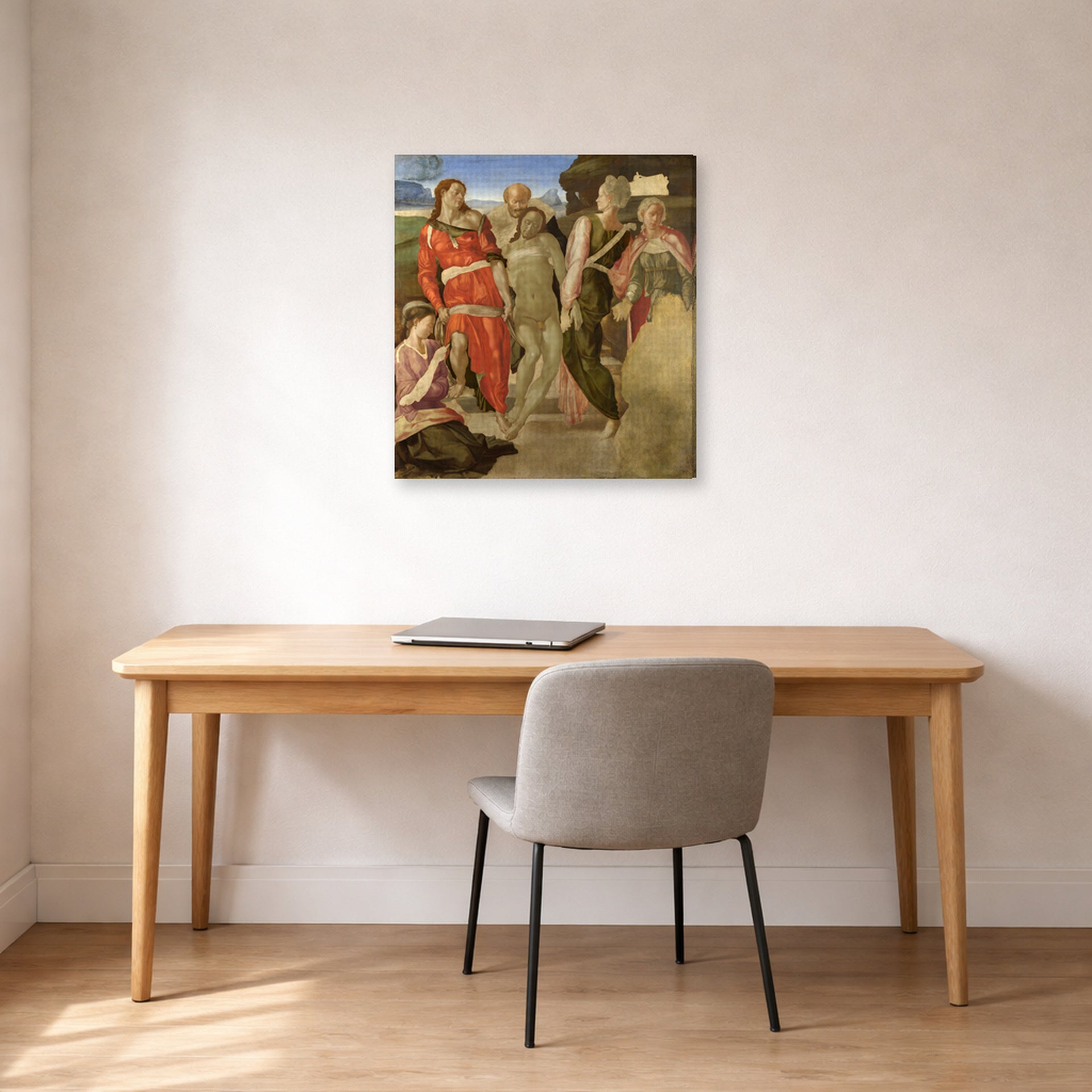 Gallery-wrapped canvas print of Michelangelo's Entombment displayed on a wall in a office
