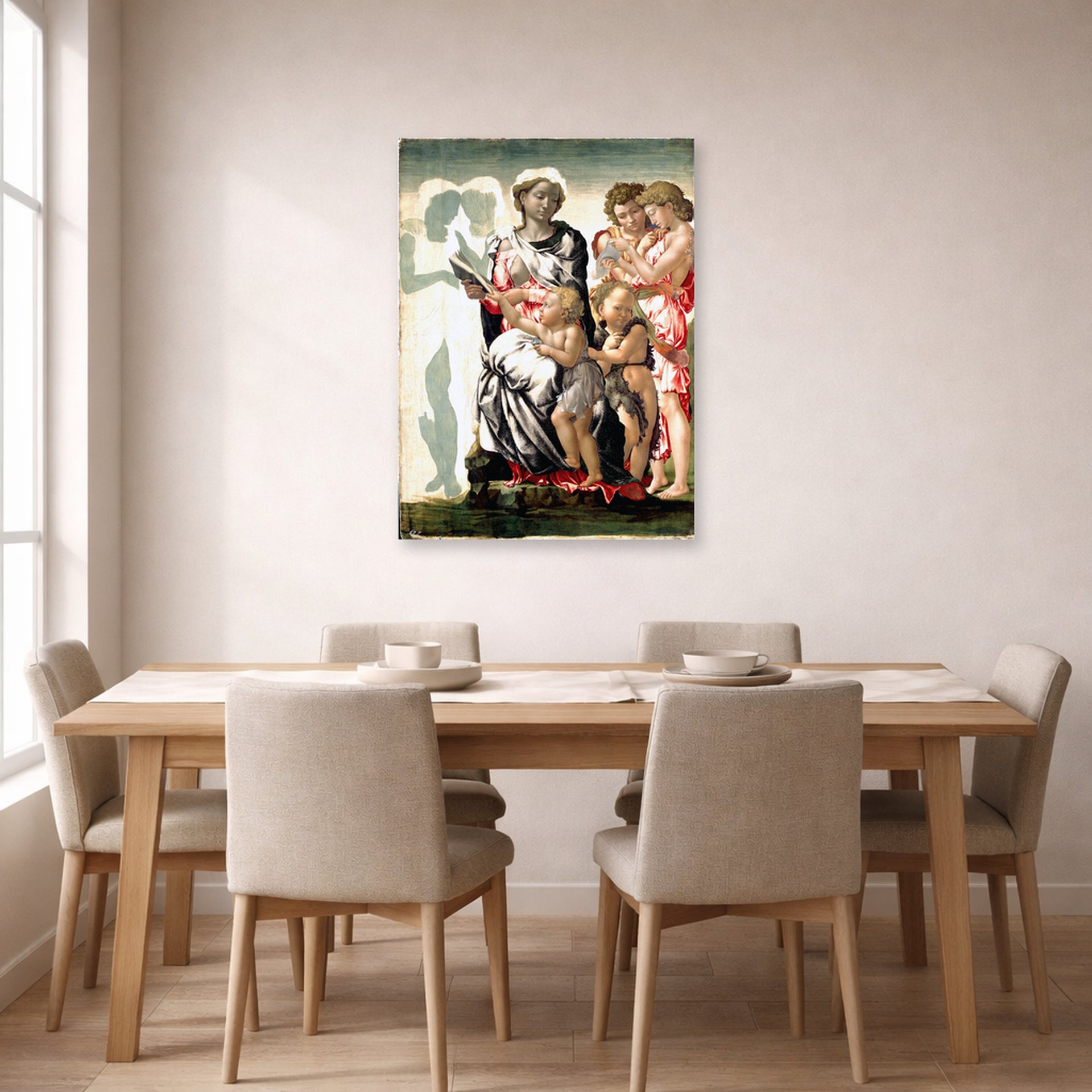 Unframed poster print of Michelangelo's Manchester Madonna displayed on a wall in a dining room