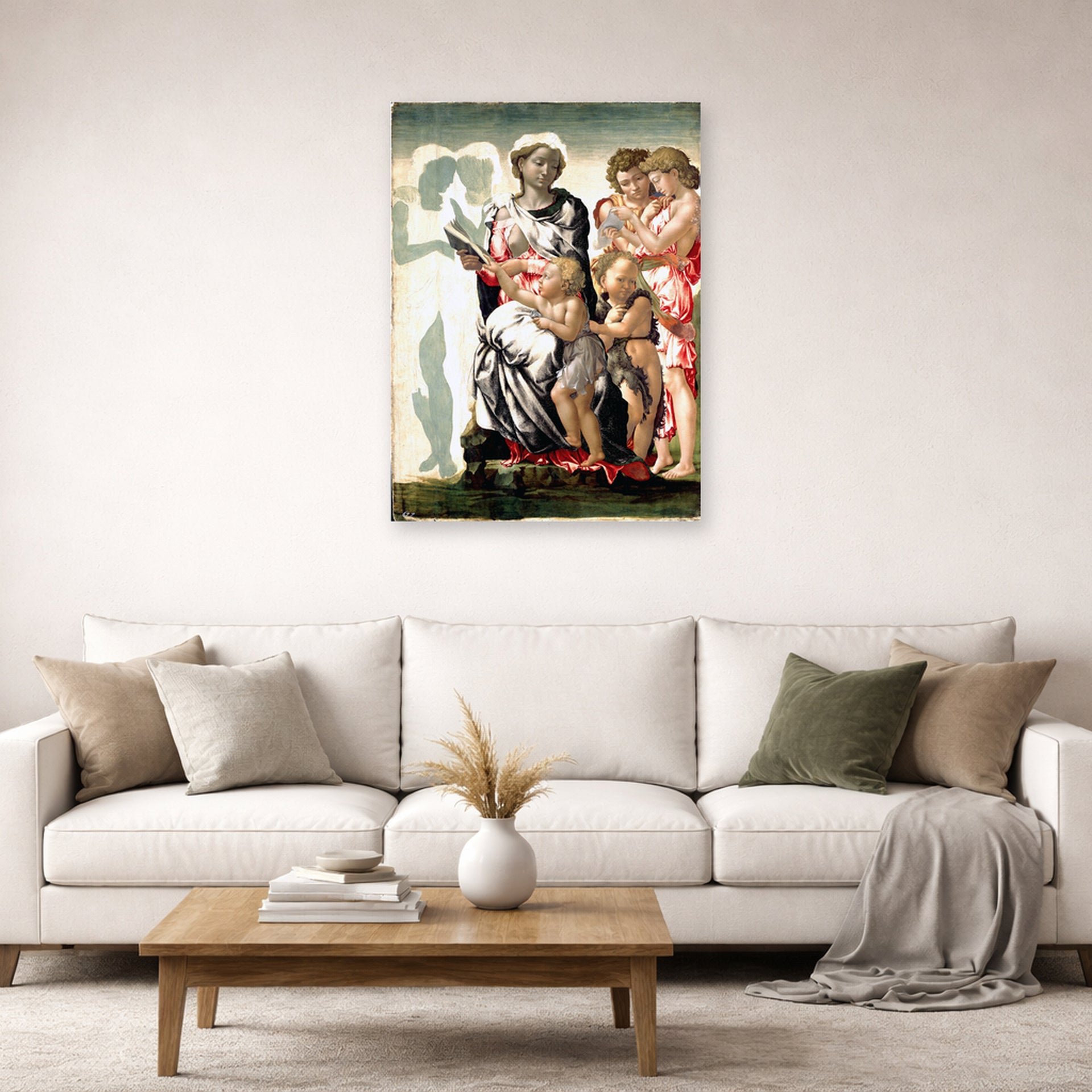Unframed poster print of Michelangelo's Manchester Madonna displayed on a wall in a living room