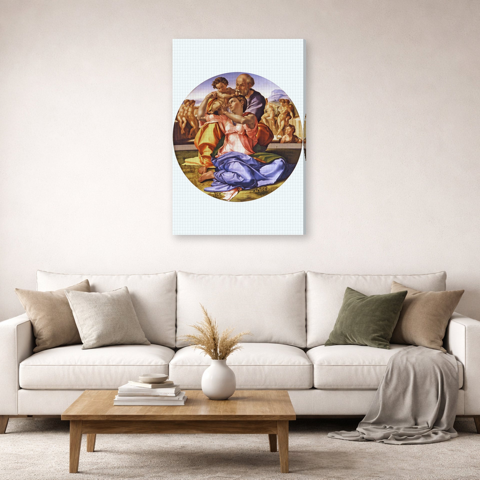 Gallery-wrapped canvas print of Michelangelo's The Doni Tondo displayed on a wall in a living room