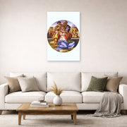 Unframed poster print of Michelangelo's The Doni Tondo displayed on a wall in a living room