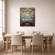 Unframed poster print of Michelangelo's The Last Judgment displayed on a wall in a dining room