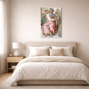 Gallery-wrapped canvas print of Michelangelo's The Prophet Isaiah displayed on a wall in a bedroom