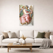 Unframed poster print of Michelangelo's The Prophet Isaiah displayed on a wall in a living room