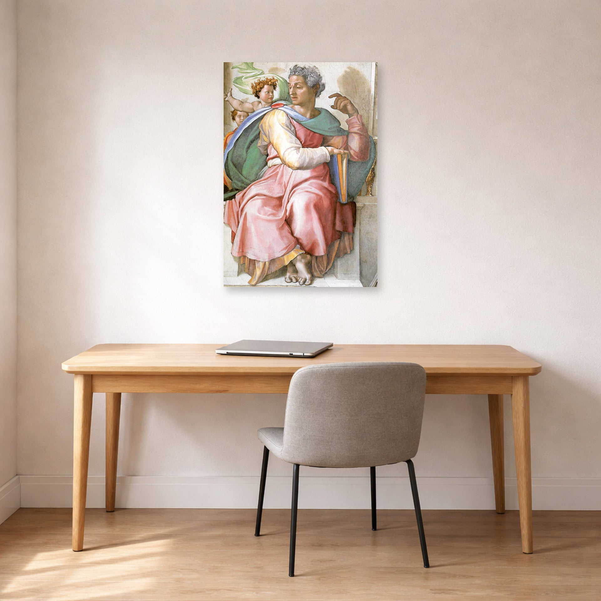 Unframed poster print of Michelangelo's The Prophet Isaiah displayed on a wall in a office