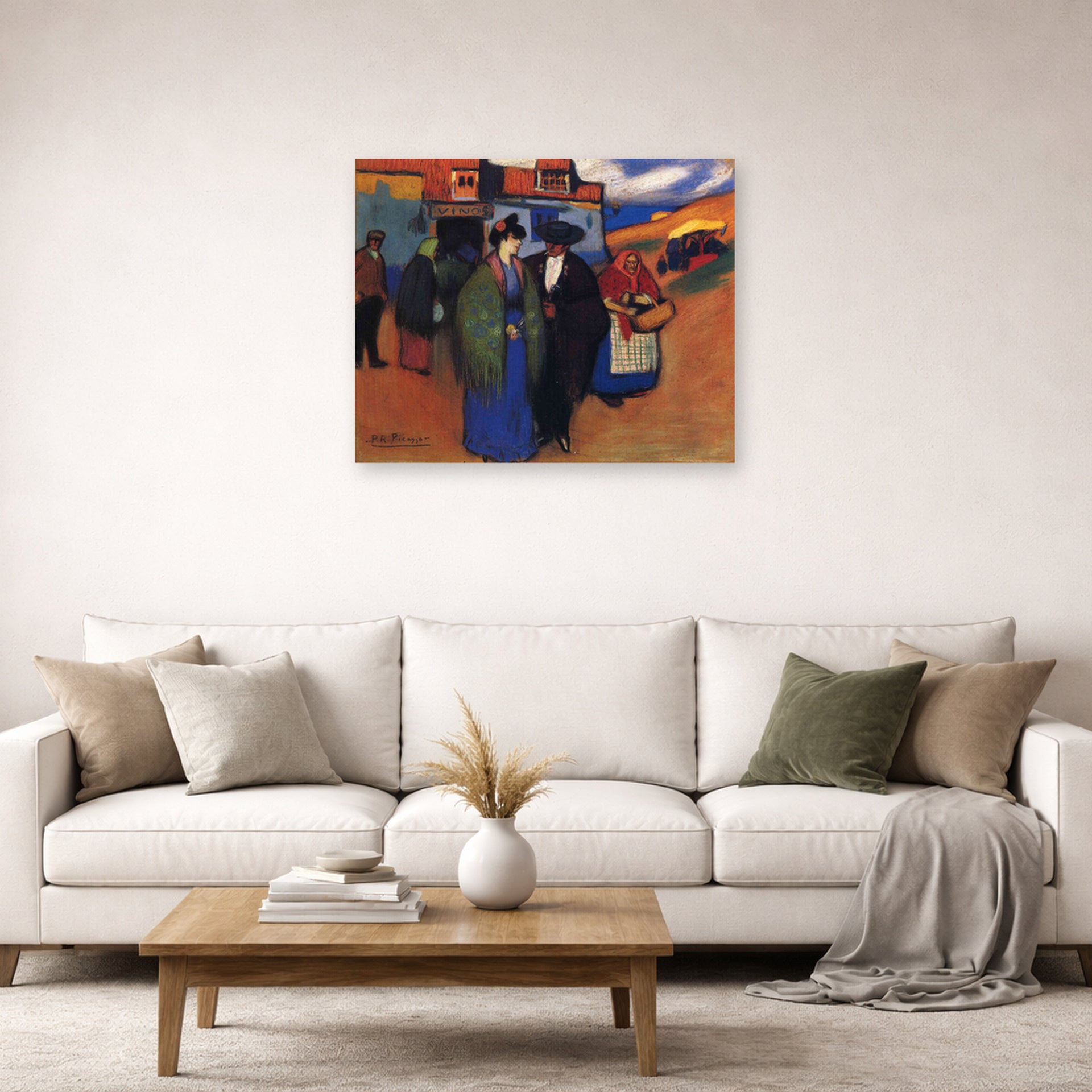 Unframed poster print of Pablo Picasso's 'A Spanish Couple in front of Inn' displayed on a wall in a living room
