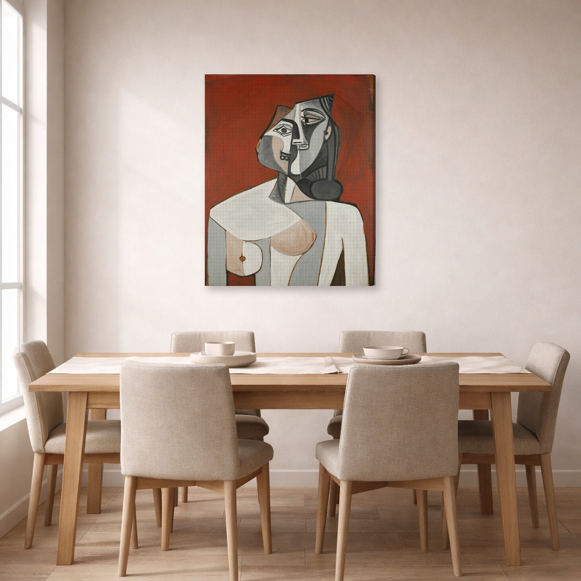 Gallery-wrapped canvas print of Pablo Picasso's 'Bust of a Woman' displayed on a wall in a dining room