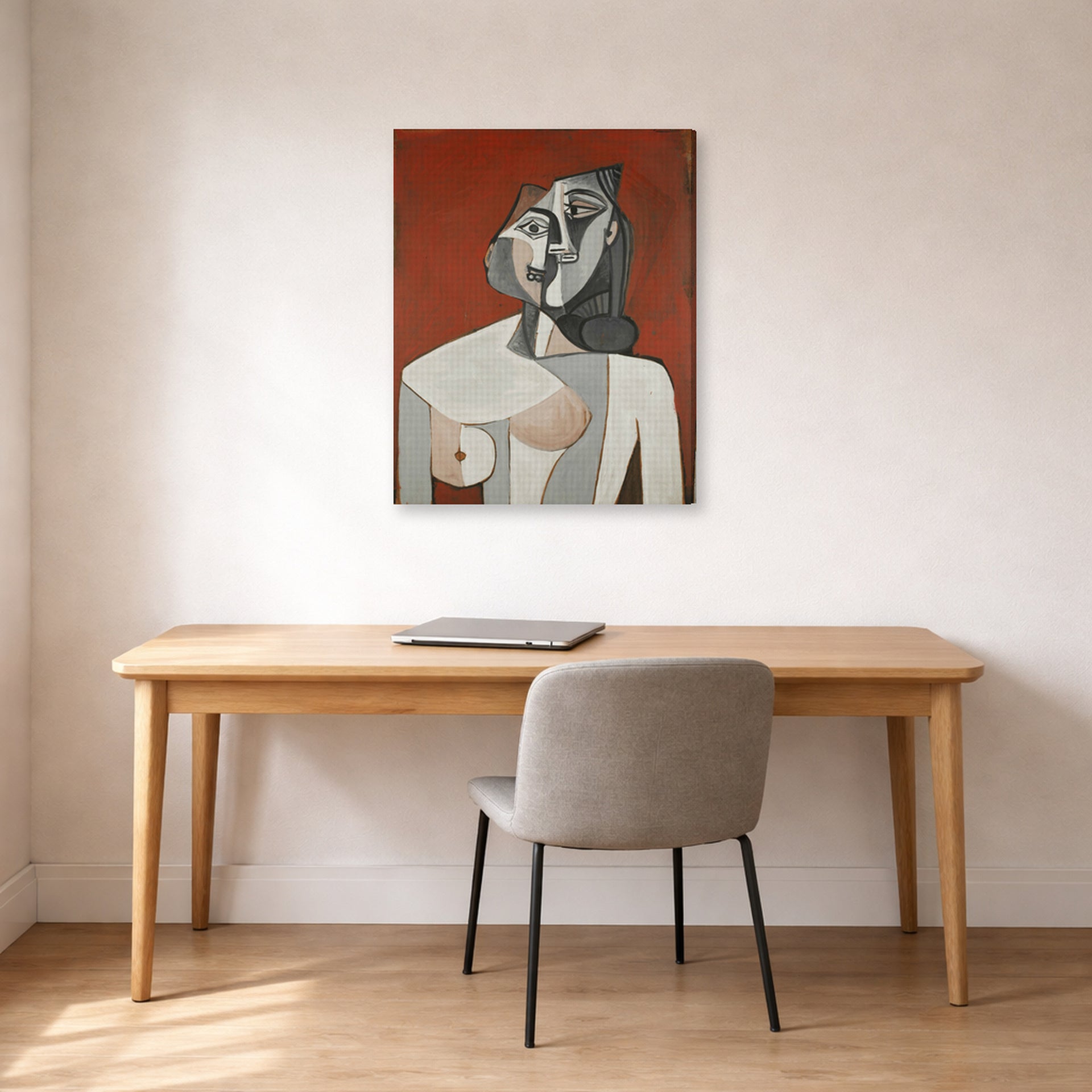 Gallery-wrapped canvas print of Pablo Picasso's 'Bust of a Woman' displayed on a wall in a home office