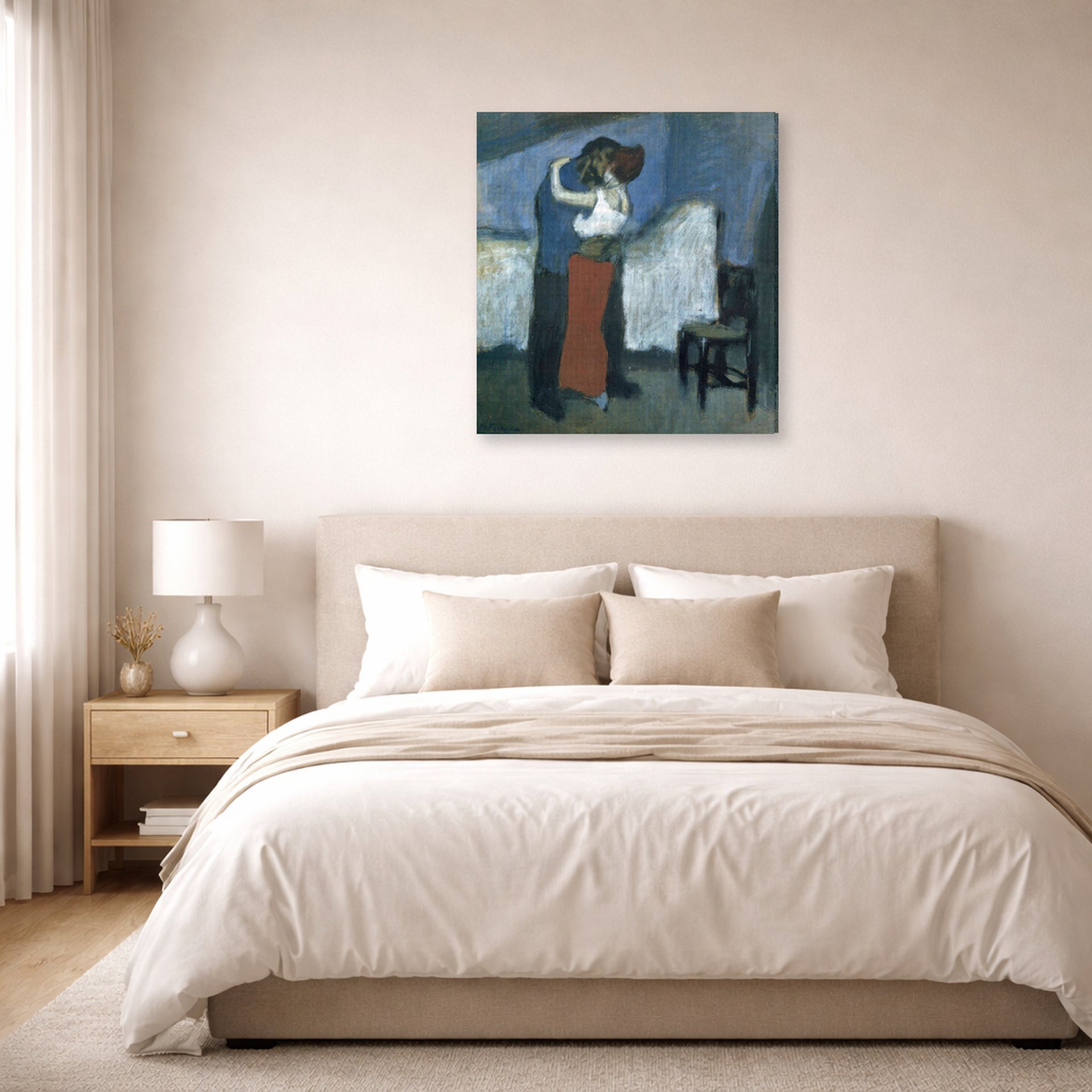 Gallery-wrapped canvas print of Pablo Picasso's 'Embrace' displayed on a wall in a bedroom