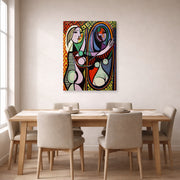 Gallery-wrapped canvas print of Pablo Picasso's 'Girl Before a Mirror' displayed on a wall in a dining room