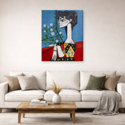 Gallery-wrapped canvas print of Pablo Picasso's 'Jacqueline with Flowers' displayed on a wall in a living room