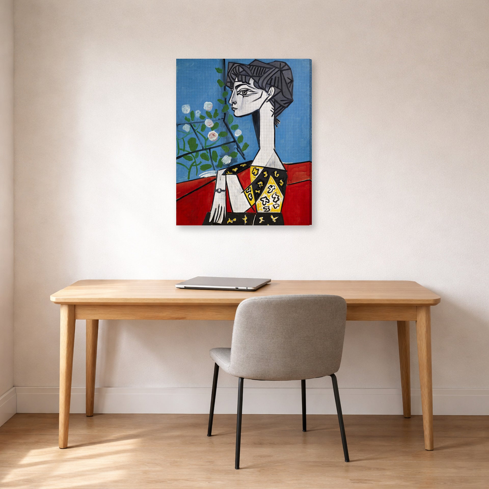 Gallery-wrapped canvas print of Pablo Picasso's 'Jacqueline with Flowers' displayed on a wall in a home office