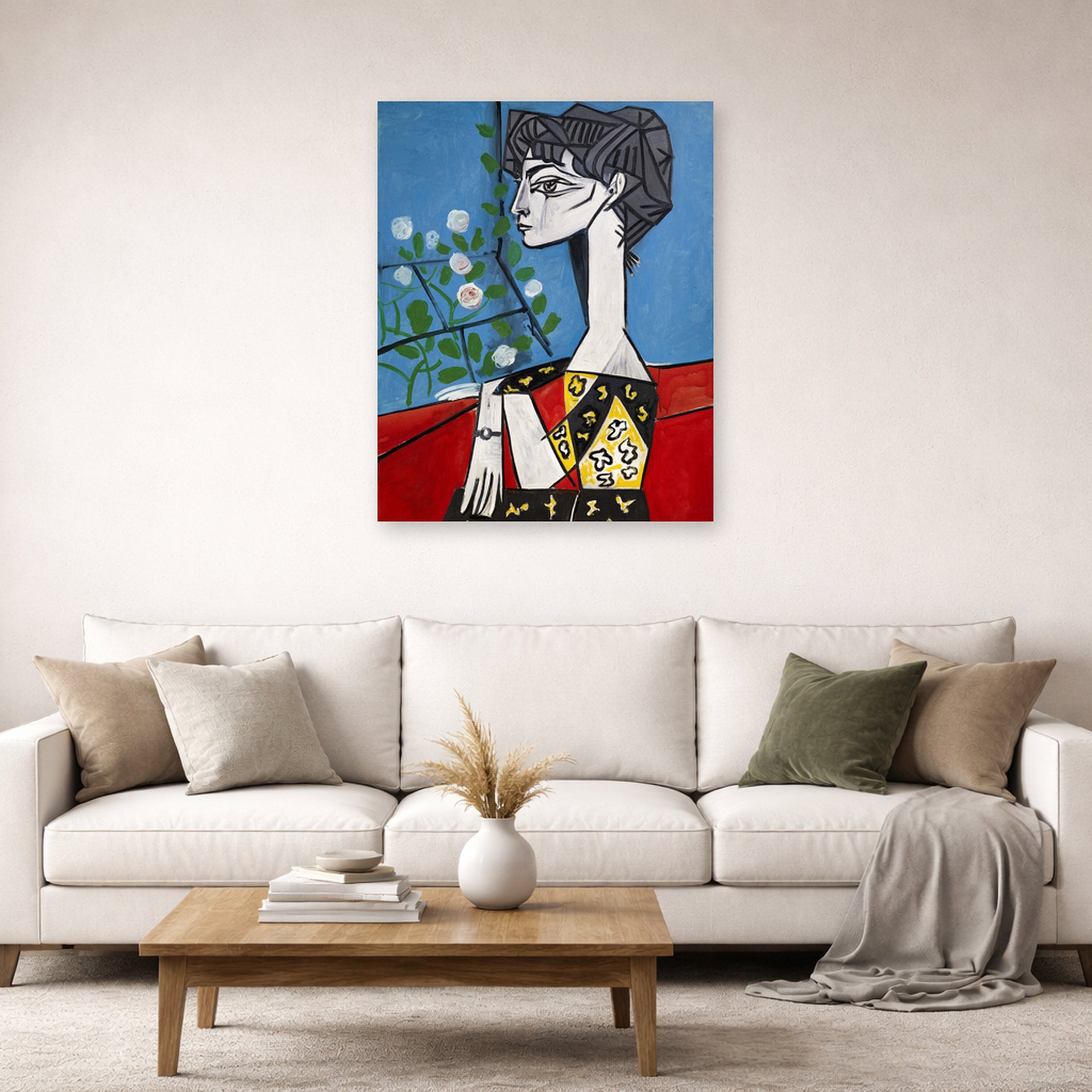 Unframed poster print of Pablo Picasso's 'Jacqueline with Flowers' displayed on a wall in a living room
