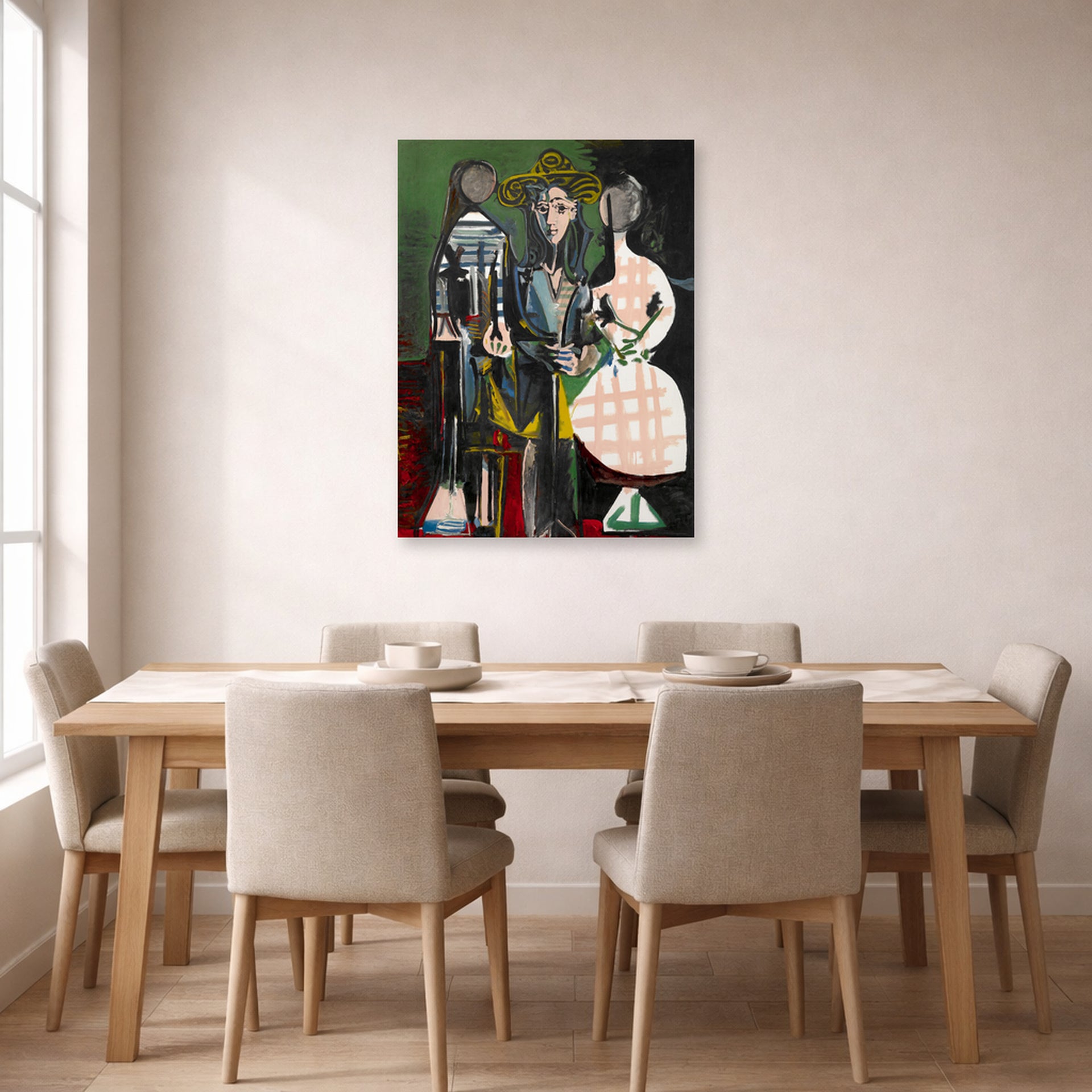 Unframed poster print of Pablo Picasso's 'Jacqueline with Paloma and Catherine' displayed on a wall in a dining room