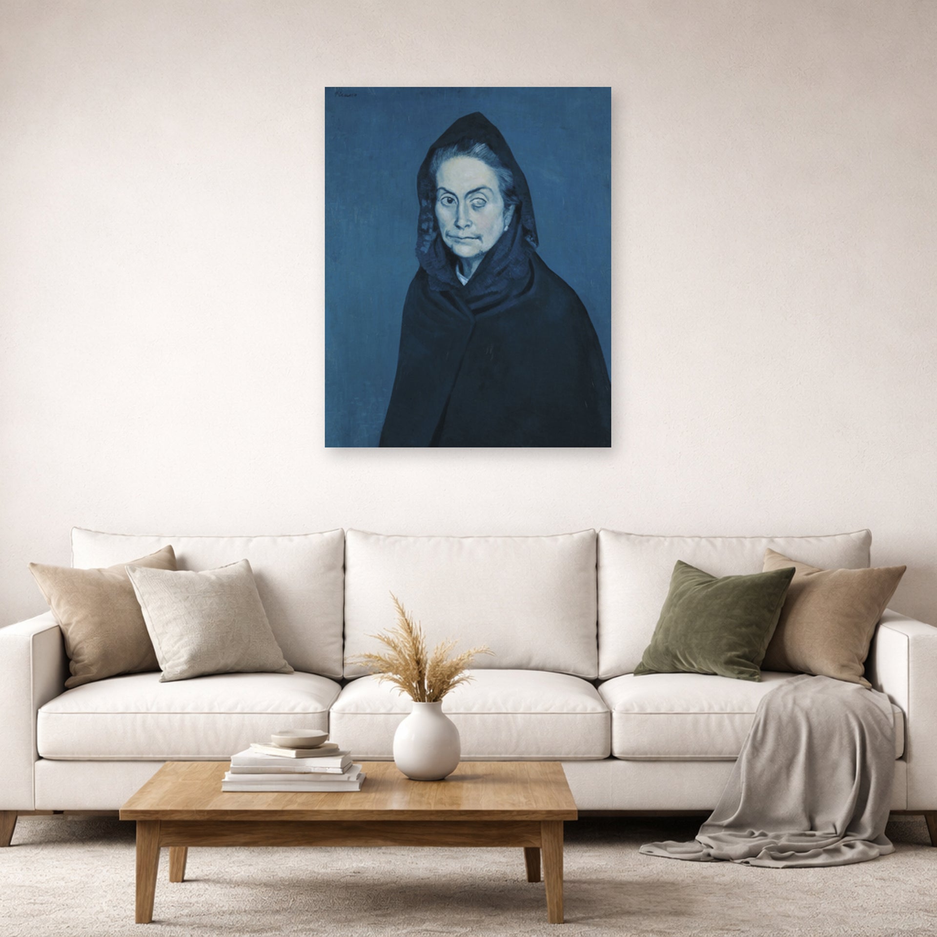 Unframed poster print of Pablo Picasso's 'La Celestine' displayed on a wall in a living room