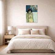 Unframed poster print of Pablo Picasso's 'La Gommeuse' displayed on a wall in a bedroom