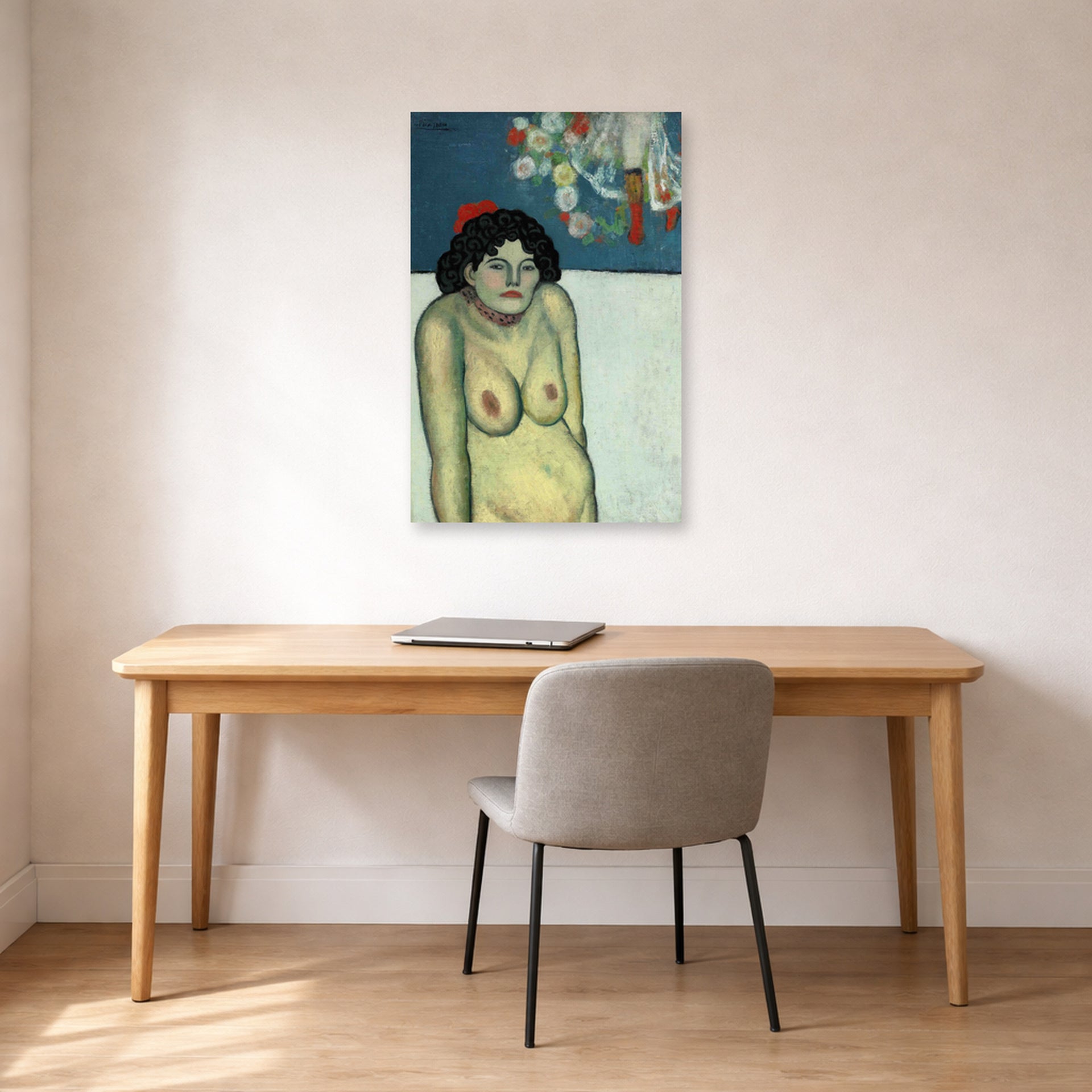Unframed poster print of Pablo Picasso's 'La Gommeuse' displayed on a wall in a home office