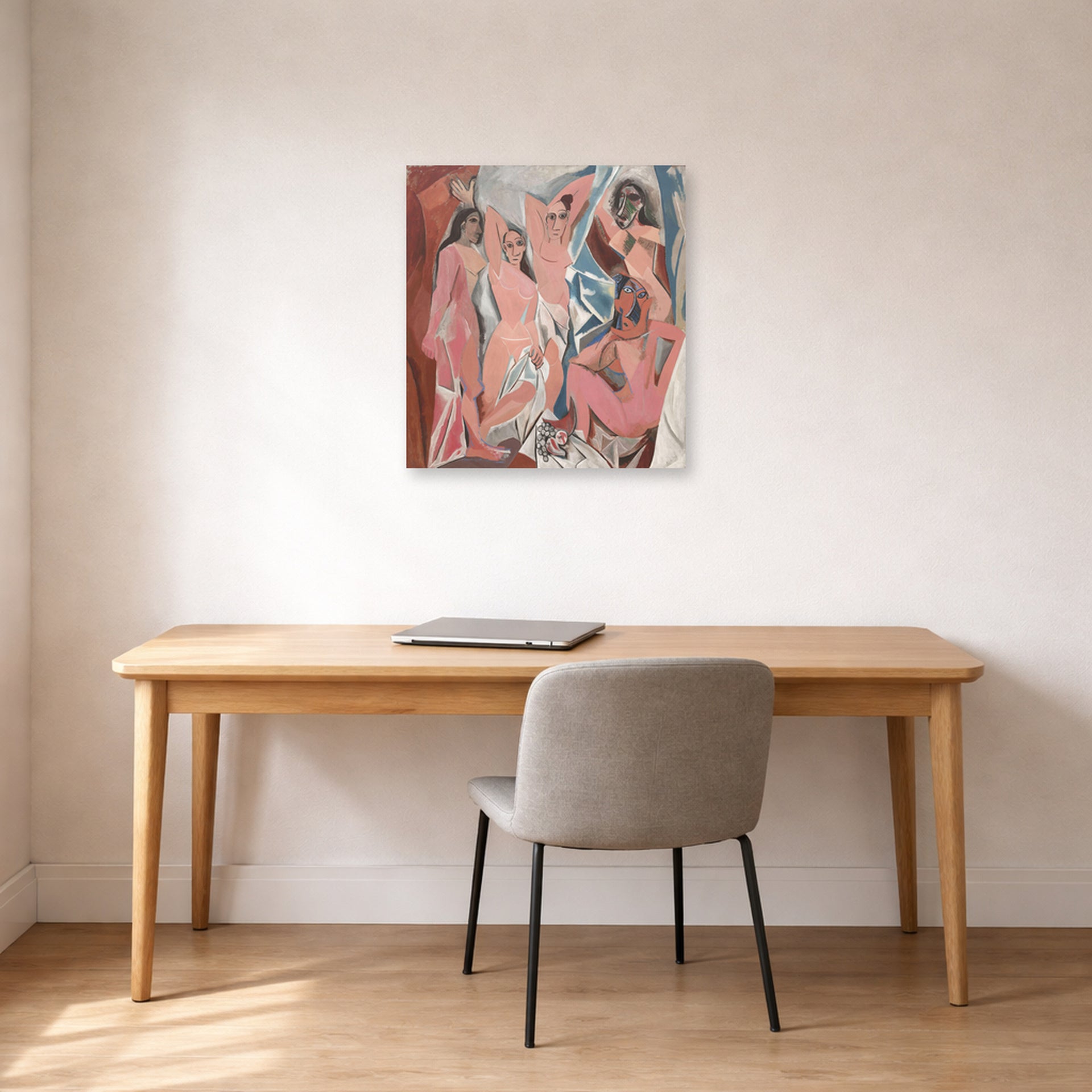 Unframed poster print of Pablo Picasso's 'Les Demoiselles d'Avignon' displayed on a wall in a home office
