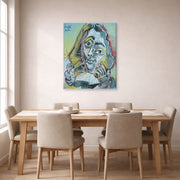 Gallery-wrapped canvas print of Pablo Picasso's 'Man Smoking a Pipe' displayed on a wall in a dining room
