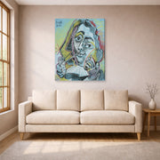 Gallery-wrapped canvas print of Pablo Picasso's 'Man Smoking a Pipe' displayed on a wall in a living room