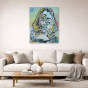 Gallery-wrapped canvas print of Pablo Picasso's 'Man Smoking a Pipe' displayed on a wall in a living room