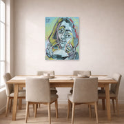 Unframed poster print of Pablo Picasso's 'Man Smoking a Pipe' displayed on a wall in a dining room