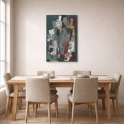 Unframed poster print of Pablo Picasso's 'Man with Pipe' displayed on a wall in a dining room