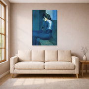Gallery-wrapped canvas print of Pablo Picasso's 'Melancholy Woman' displayed on a wall in a living room