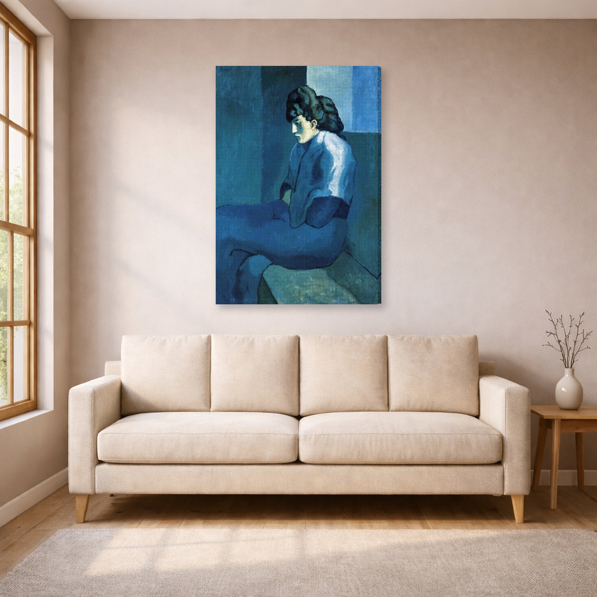 Gallery-wrapped canvas print of Pablo Picasso's 'Melancholy Woman' displayed on a wall in a living room