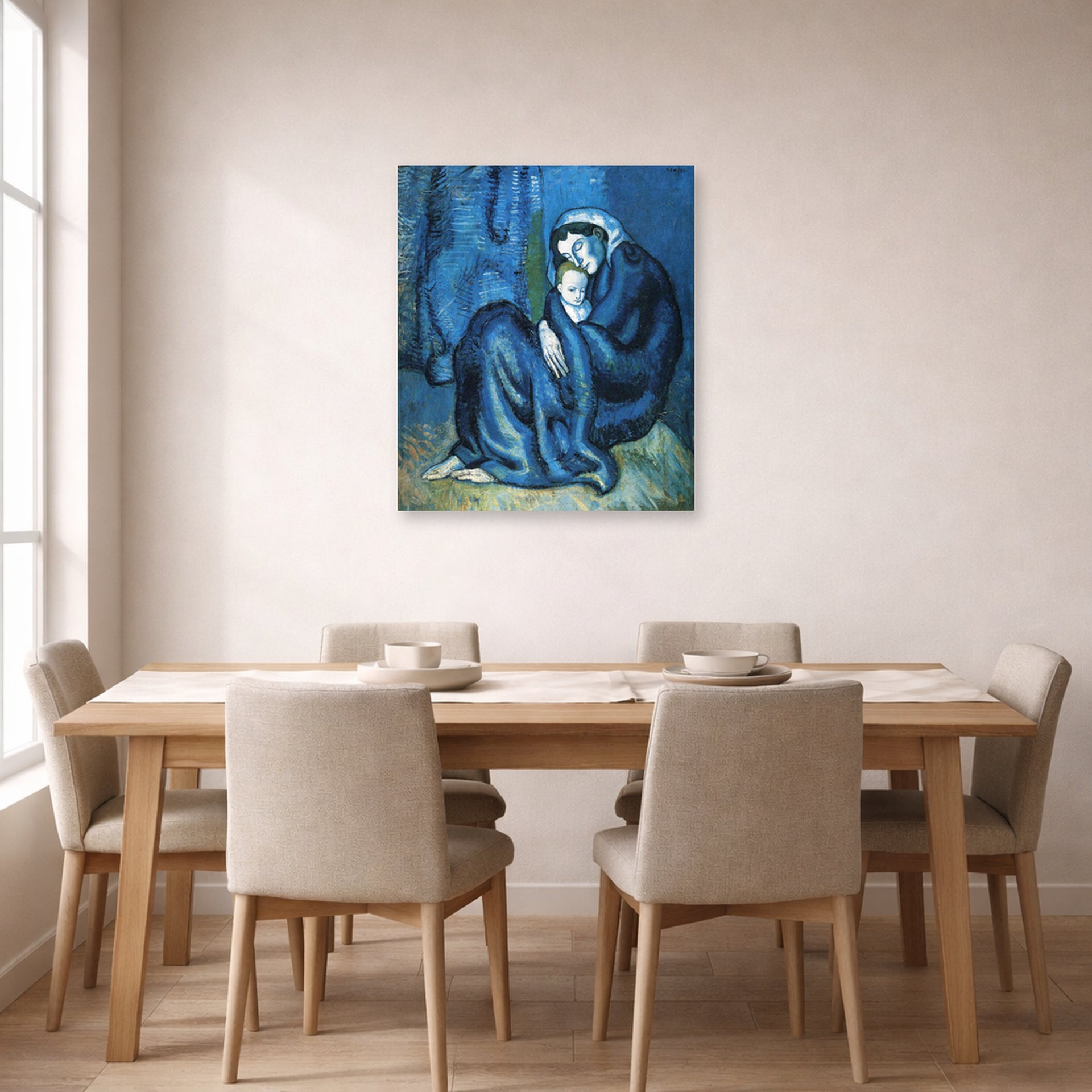 Unframed poster print of Pablo Picasso's 'Mother and Child' displayed on a wall in a dining room