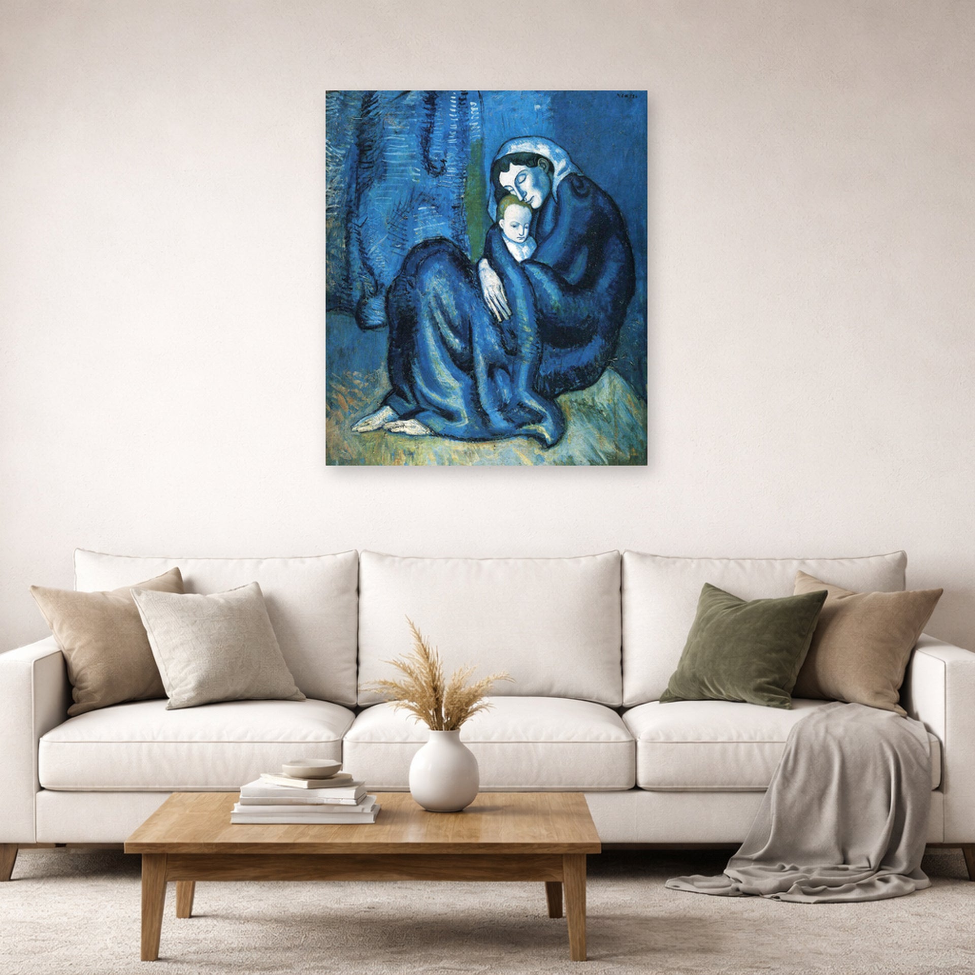 Unframed poster print of Pablo Picasso's 'Mother and Child' displayed on a wall in a living room