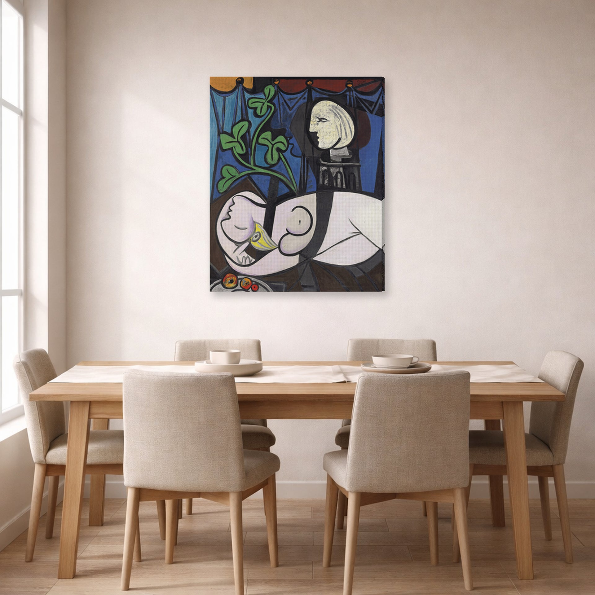 Gallery-wrapped canvas print of Pablo Picasso's 'Nude Green Leaves and Bus' displayed on a wall in a dining room