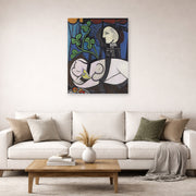 Unframed poster print of Pablo Picasso's 'Nude Green Leaves and Bus' displayed on a wall in a living room