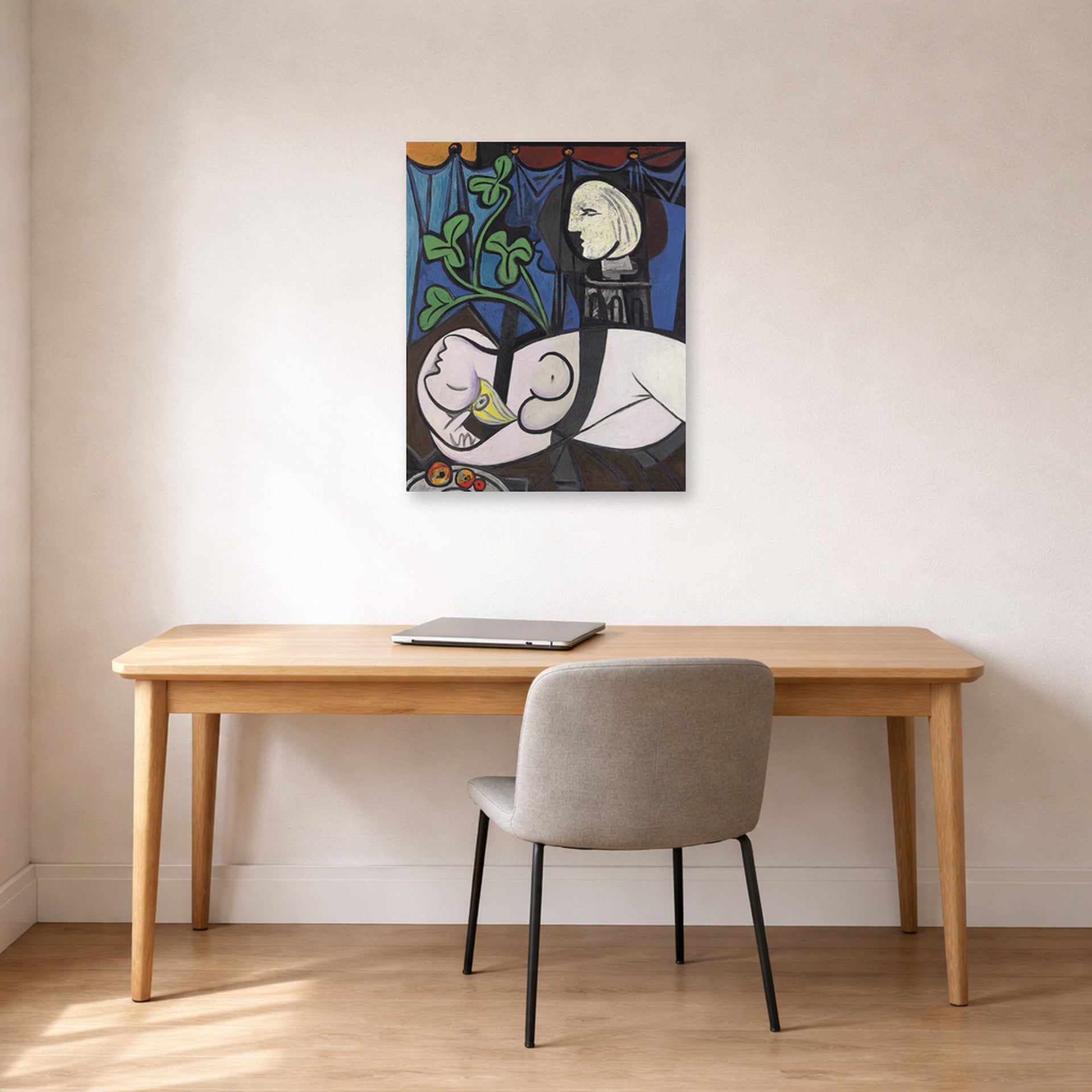Unframed poster print of Pablo Picasso's 'Nude Green Leaves and Bus' displayed on a wall in a home office