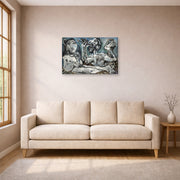 Gallery-wrapped canvas print of Pablo Picasso's 'Nude Lovers' displayed on a wall in a living room