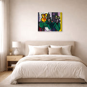 Gallery-wrapped canvas print of Pablo Picasso's 'Pitcher and a Bowl of Fruit' displayed on a wall in a bedroom