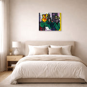 Unframed poster print of Pablo Picasso's 'Pitcher and a Bowl of Fruit' displayed on a wall in a bedroom
