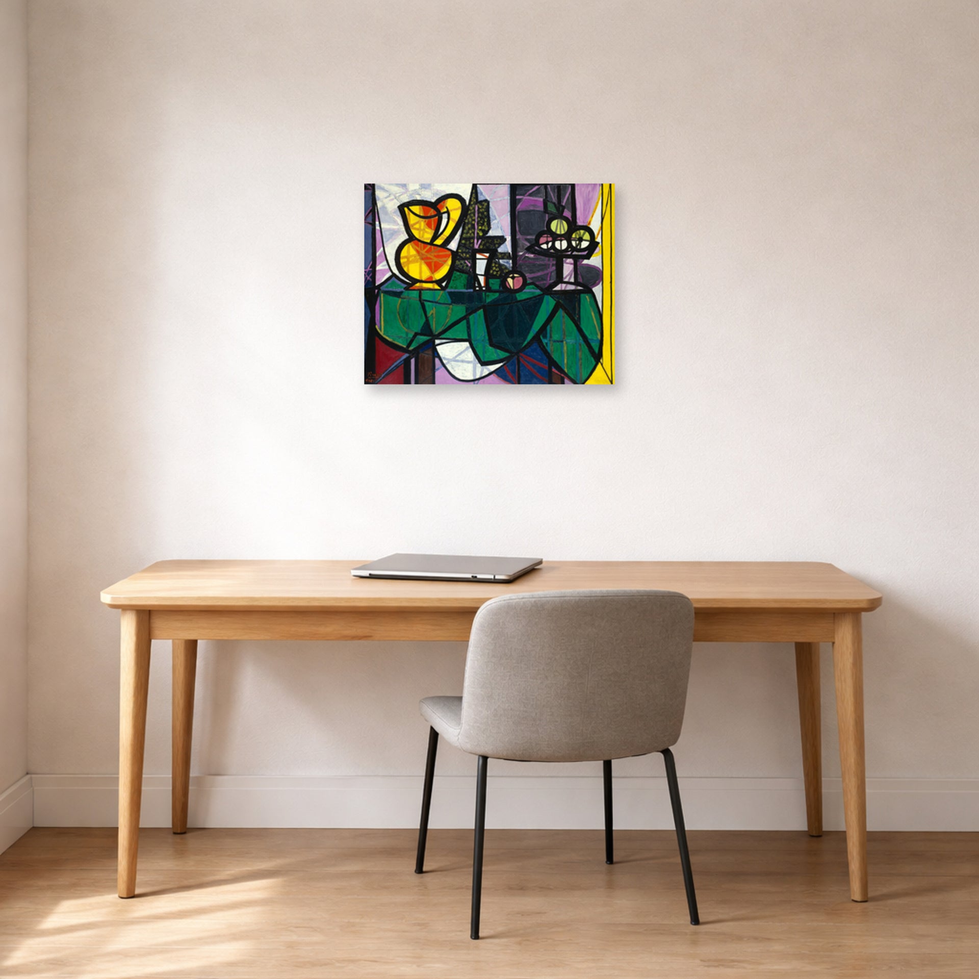 Unframed poster print of Pablo Picasso's 'Pitcher and a Bowl of Fruit' displayed on a wall in a home office