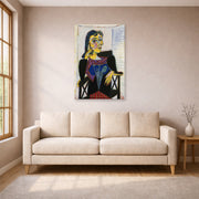 Unframed poster print of Pablo Picasso's 'Portrait of Dora Maar' displayed on a wall in a living room
